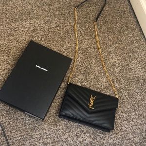 Black Crossbody small envelope, Saint Laurent purse/with Gold hardware.